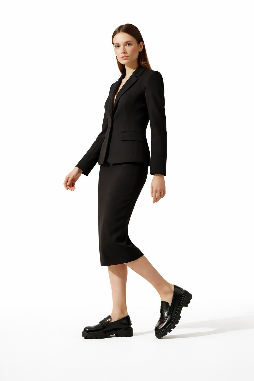 TOD'S Black Leather Flat Sole Loafers - Side View
